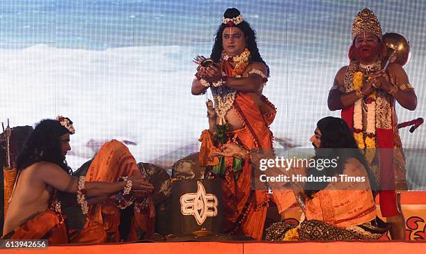 Artists perform as Rama, Laxman, Ravana and Hanuman during a Ramleela, organized by the Nav Shri Dharmik Leela committee, at Red Fort, on October 9,...