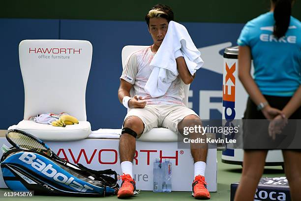 Yuichi Sugita of Japan take a break during the match against Marcel Granollers of Spain in second round of ATP Shanghai Rolex Masters 2016 on Day 3...