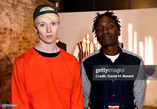 Designers Agape Mdumulla and Sam Cotton of Agi & Sam attend the Agi & Sam x Lacoste L!ve Collection Launch on October 11, 2016 in London, United...