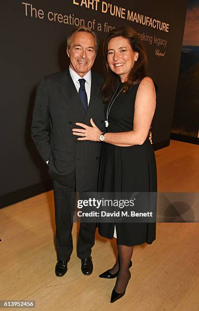 Karl-Friedrich Scheufele, Co-President of Chopard, and Christine Scheufele attend the cocktail opening of the Chopard exhibition 'L.U.C - L'art d'une...