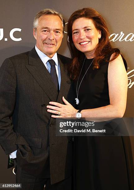 Karl-Friedrich Scheufele, Co-President of Chopard, and Christine Scheufele attend the cocktail opening of the Chopard exhibition 'L.U.C - L'art d'une...