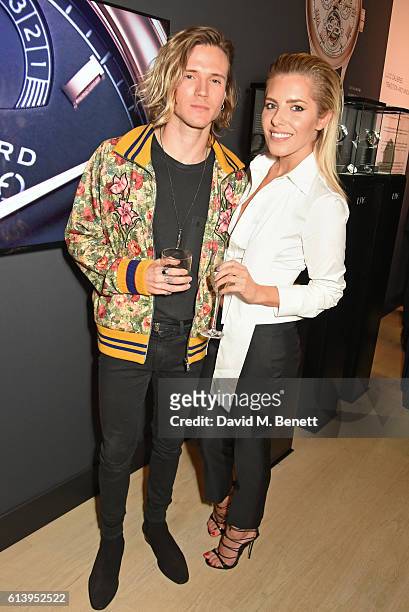 Dougie Poynter and Mollie King attend the cocktail opening of the Chopard exhibition 'L.U.C - L'art d'une Manufacture' at Phillips Gallery on October...