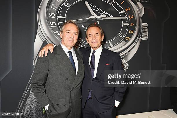 Karl-Friedrich Scheufele, Co-President of Chopard, and Jacky Ickx attend the cocktail opening of the Chopard exhibition 'L.U.C - L'art d'une...
