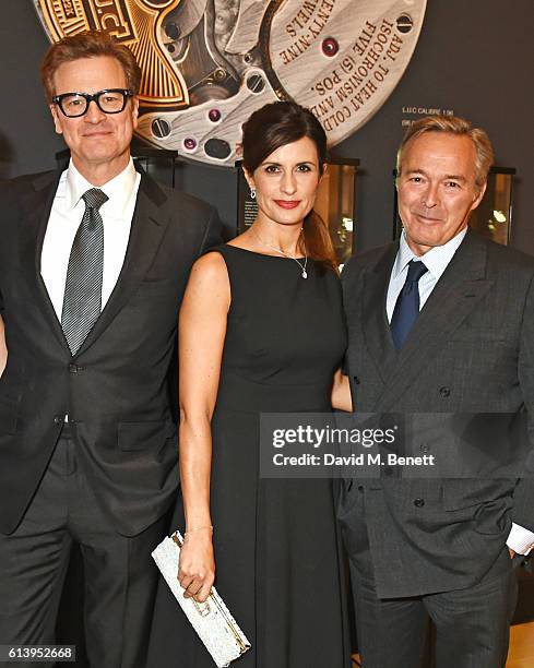 Colin Firth, Livia Firth and Karl-Friedrich Scheufele, Co-President of Chopard, attend the cocktail opening of the Chopard exhibition 'L.U.C - L'art...