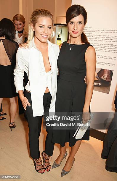 Mollie King and Livia Firth attend the cocktail opening of the Chopard exhibition 'L.U.C - L'art d'une Manufacture' at Phillips Gallery on October...