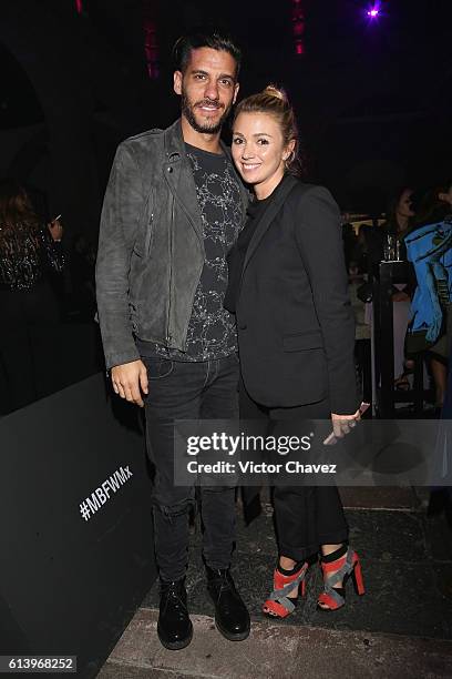 Erick Elias and his wife Karla Guindi attend the first day of Mercedes-Benz Fashion Week Mexico Spring/Summer 2017 at Ex Convento De San Hipolito on...