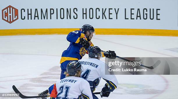 Right defender Jesse Virtanen of Rauma shoots during the Champions Hockey League Round of 32 match between Lukko Rauma and HV71 Jonkoping at...