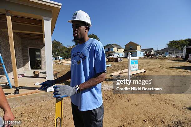 Stephens of the Memphis Grizzlies helps to build new homes with Habitat for humanity on October 7 at Bearwater Park in Memphis, Tennessee. NOTE TO...