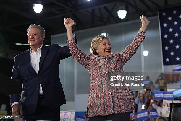 Democratic presidential nominee former Secretary of State Hillary Clinton and former Vice President Al Gore campaign together at the Miami Dade...