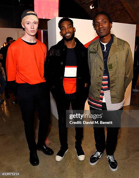 Tinie Tempah with designers Agape Mdumulla and Sam Cotton of Agi & Sam attend the Agi & Sam x Lacoste L!ve Collection Launch on October 11, 2016 in...