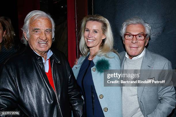 Actor Jean-Paul Belmondo with Jean-Daniel Lorieux and his companion Laura Restelli attend the "Ivo Livi ou le destin d'Yves Montand" : Theater Play...