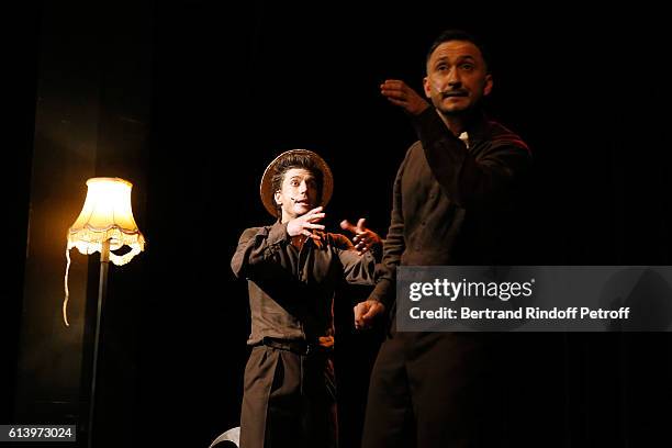 Benjamin Falletto and Cristos Mitropoulos perform during the "Ivo Livi ou le destin d'Yves Montand" : Theater Play at Theatre de la Gaite...