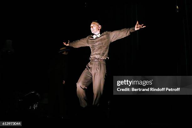 Cristos Mitropoulos performs during the "Ivo Livi ou le destin d'Yves Montand" : Theater Play at Theatre de la Gaite Montparnasse on October 11, 2016...