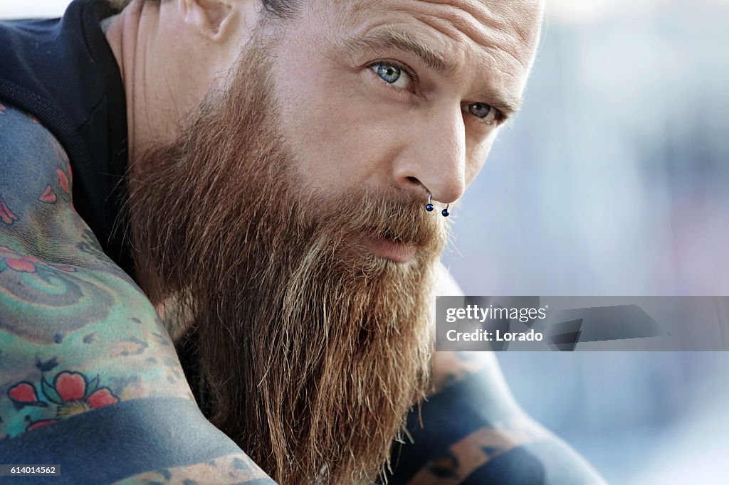 Closeup Of Bearded Tattooed Blue Eyed Handsome Man High-Res Stock Photo -  Getty Images