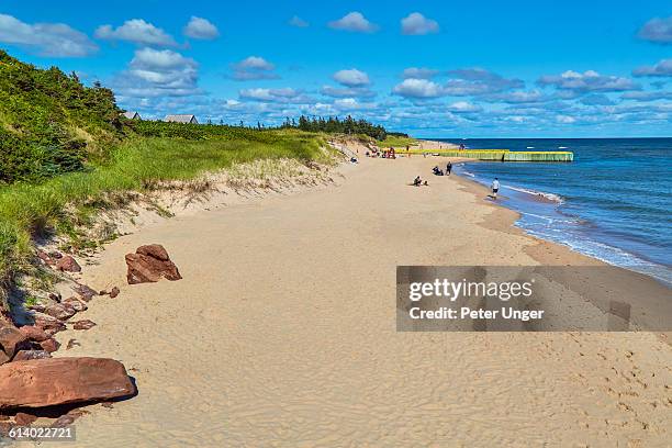 beach at basin head, prince edward island - prince edward island stock pictures, royalty-free photos & images