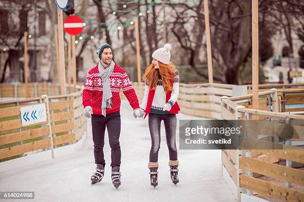 winter love - learning to ice skate stock pictures, royalty-free photos & images