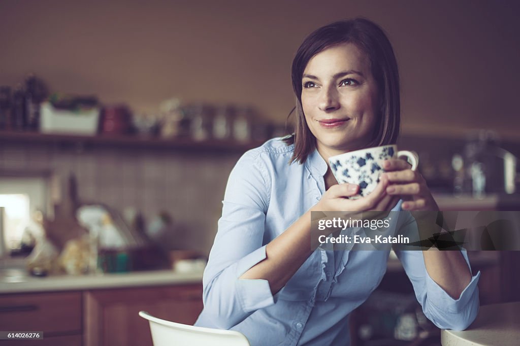 Beautiful young woman at home