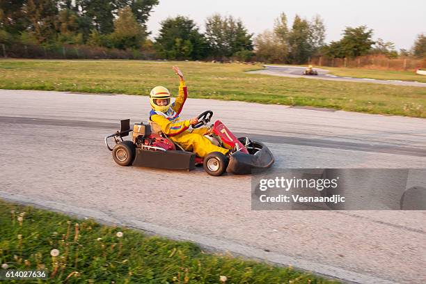 friends at amusement park - go cart stock pictures, royalty-free photos & images