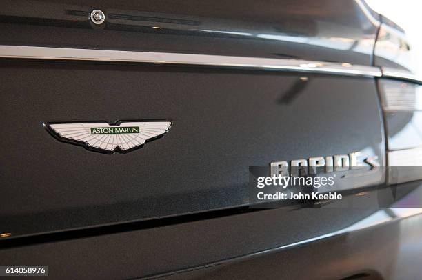 General view of an Aston Martin Rapide S logo badge on a new Aston Martin car on October 6, 2016 in Brentwood, United Kingdom.