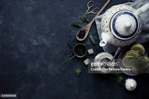 tea and teapot - teesieb stock-fotos und bilder