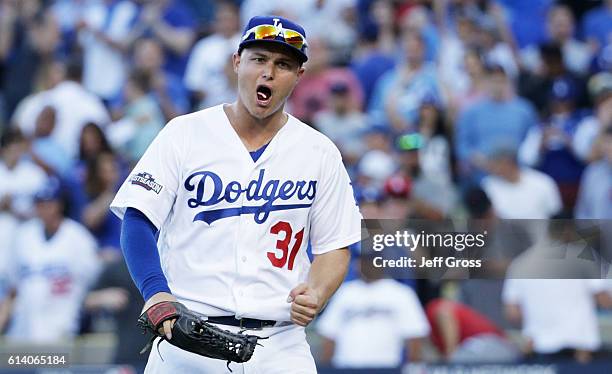 Joc Pederson of the Los Angeles Dodgers celebrates their 6 to 5 victory over the Washington Nationals during game four of the National League...