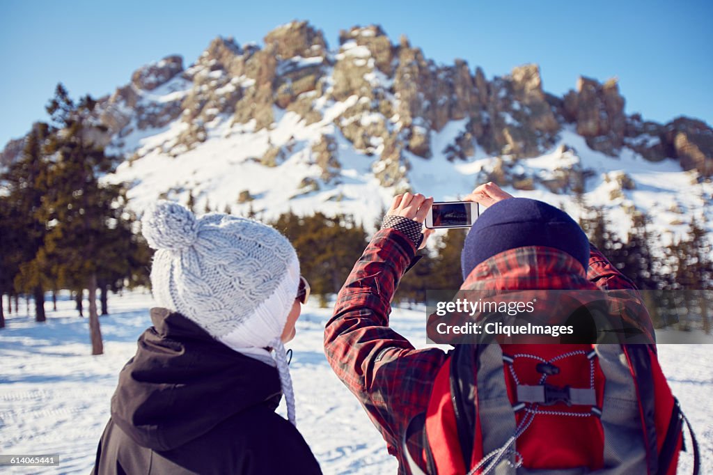 Photographing mountain landscape