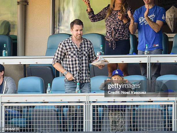 Rob McElhenney and Leo Grey McElhenney attend a baseball game between the Washington Nationals and Los Angeles Dodgers at Dodger Stadium on October...