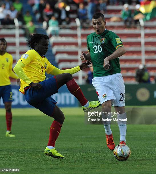 Pablo Escobar of Bolivia and Juan Carlos Paredes of Ecuador fight for the ball during a match between Bolivia and Ecuador as part of FIFA 2018 World...