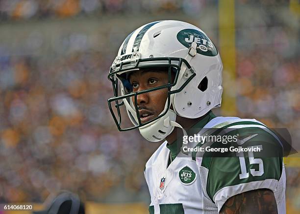 Wide receiver Brandon Marshall of the New York Jets looks on from the sideline during a game against the Pittsburgh Steelers at Heinz Field on...