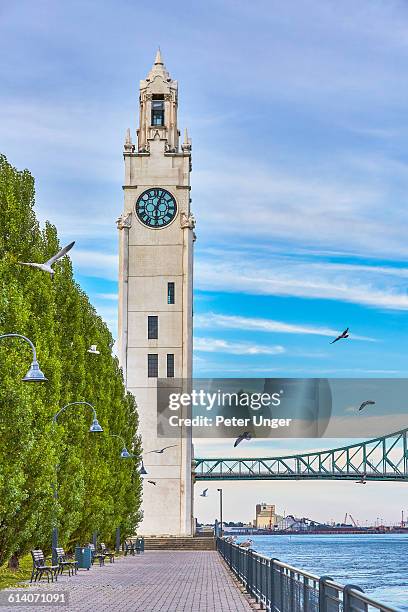 old port clock tower, montreal - montreal clock tower stock pictures, royalty-free photos & images