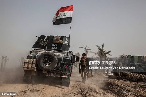 "nFALLUJAH, IRAQ, The 4th of June 2016."nA man of the head of the Golden Division"u2019s column, the Special Forces of the ICTF progress in...