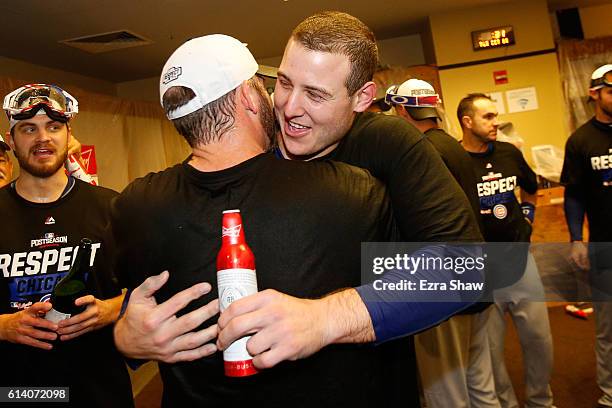 Anthony Rizzo of the Chicago Cubs celebrates in the locker room after defeating the San Francisco Giants 6-5 in Game Four of their National League...