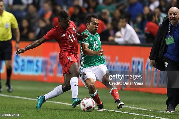 Adrian Aldrete of Mexico fights for the ball with Armando Cooper of Panama during the International Friendly Match between Mexico and Panama at...