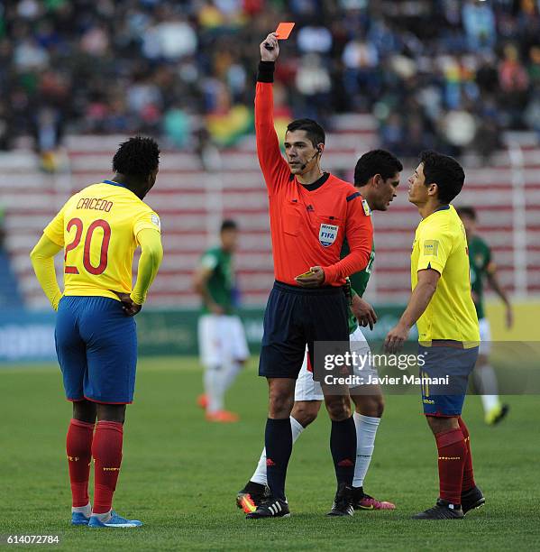 Referee Mario Díaz shows a red card to Luis Caicedo of Ecuador during a match between Bolivia and Ecuador as part of FIFA 2018 World Cup Qualifiers...