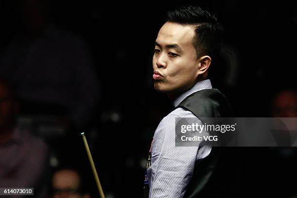 Marco Fu of Chinese Hong Kong reacts during the first round match against Martin O'Donnell of England on day two of the Coral English Open 2016 at...