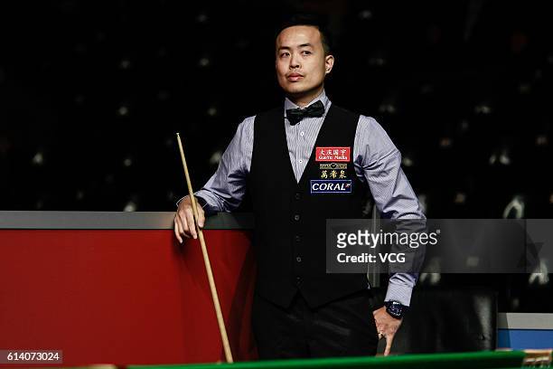 Marco Fu of Chinese Hong Kong reacts during the first round match against Martin O'Donnell of England on day two of the Coral English Open 2016 at...