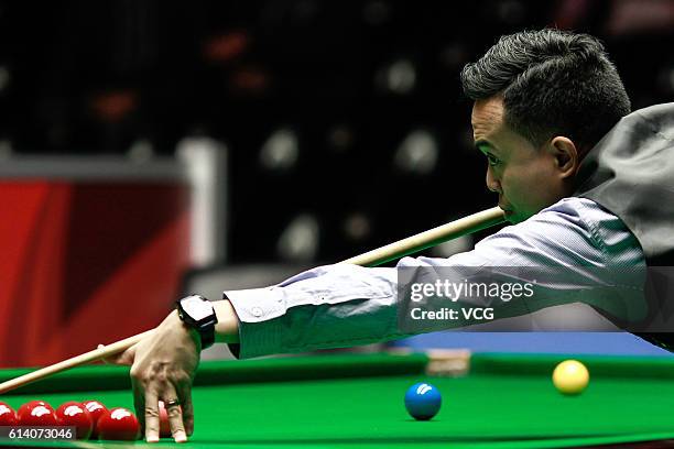 Marco Fu of Chinese Hong Kong plays a shot during the first round match against Martin O'Donnell of England on day two of the Coral English Open 2016...