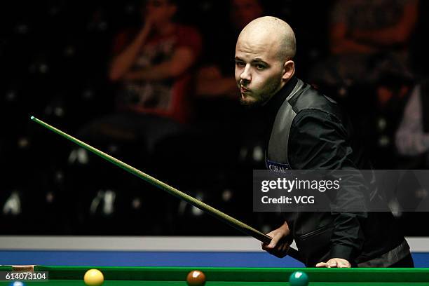 Luca Brecel of Belgium reacts during the first round match against Ali Carter of England on day two of the Coral English Open 2016 at Event City on...