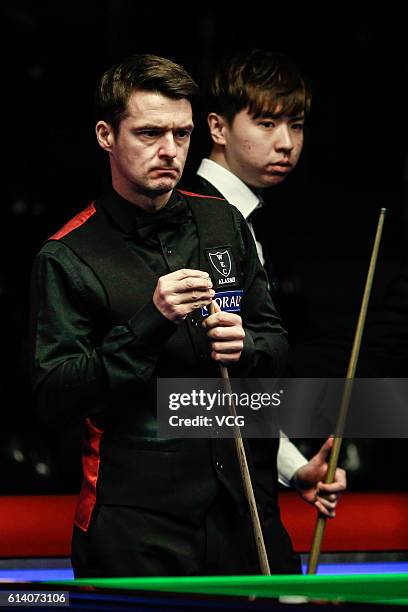 Michael Holt of England reacts during the first round match against Xiao Guodong of China on day two of the Coral English Open 2016 at Event City on...