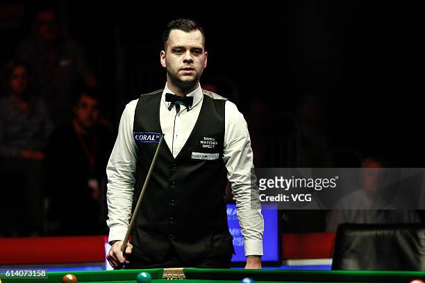 Jimmy Robertson of England reacts during the first round match against Ronnie O'Sullivan of England on day two of the Coral English Open 2016 at...