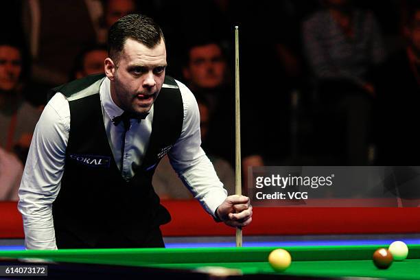 Jimmy Robertson of England reacts during the first round match against Ronnie O'Sullivan of England on day two of the Coral English Open 2016 at...