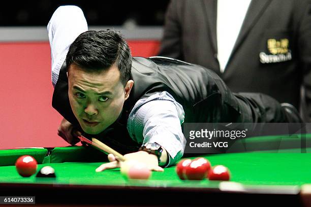 Marco Fu of Chinese Hong Kong plays a shot during the first round match against Martin O'Donnell of England on day two of the Coral English Open 2016...
