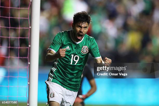 Oribe Peralta of Mexico celebrates after scoring his team's first goal during the International Friendly Match between Mexico and Panama at Toyota...