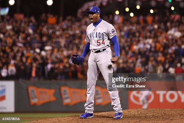 Aroldis Chapman of the Chicago Cubs celebrates after defeating the San Francisco Giants 6-5 in Game Four of their National League Division Series to...