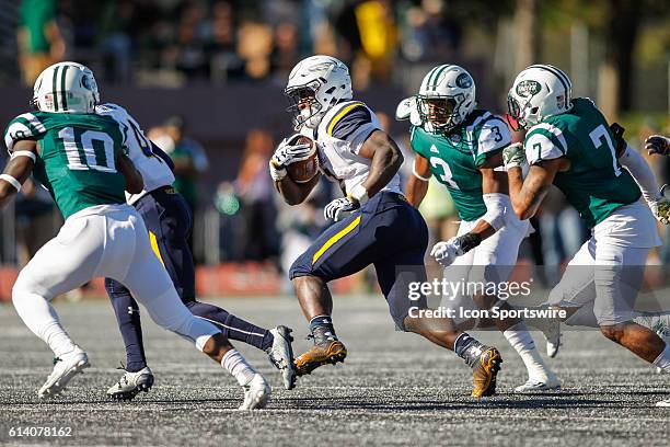Toledo Rockets running back Terry Swanson runs with the ball during game action between the Toledo Rockets and the Eastern Michigan Eagles played at...