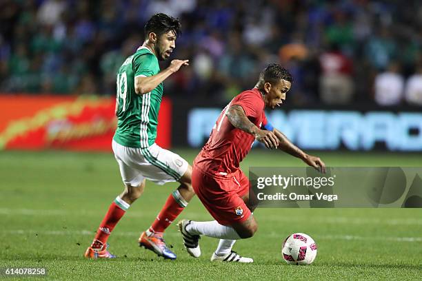 Oribe Peralta of Mexico marks Amilcar Henriquez of Panama during the International Friendly Match between Mexico and Panama at Toyota Park on October...