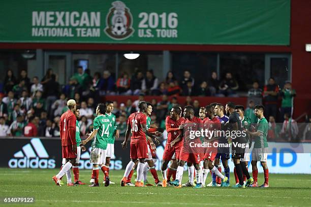 Players of Mexico and Panama argue during the International Friendly Match between Mexico and Panama at Toyota Park on October 11, 2016 in Chicago,...