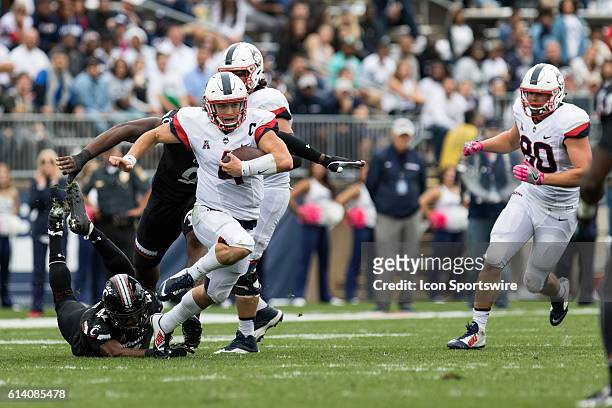UConn Quarterback Bryant Shirreffs rushes during the second half of a NCAA football game between, AAC rivals, the Cincinnati Bearcats and the UConn...