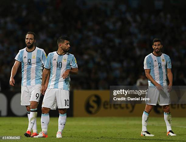 Gonzalo Higuain, Sergio Aguero and Mateo Musacchio of Argentina leave the field during a match between Argentina and Paraguay as part of FIFA 2018...