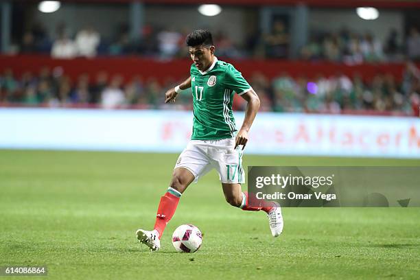 Jesus Gallardo of Mexico drives the ball during the International Friendly Match between Mexico and Panama at Toyota Park on October 11, 2016 in...